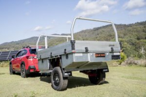 rear side view of high suspension on aluminium trailer. Low-Tare Aluminium Trailer with Extreme 4WD Off-Road Airbag Suspension for Brisbane and Gold Coast.