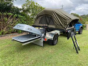 Blaze Nano Trailer showing Dune rooftop tent folded out, and an open thule storage box.